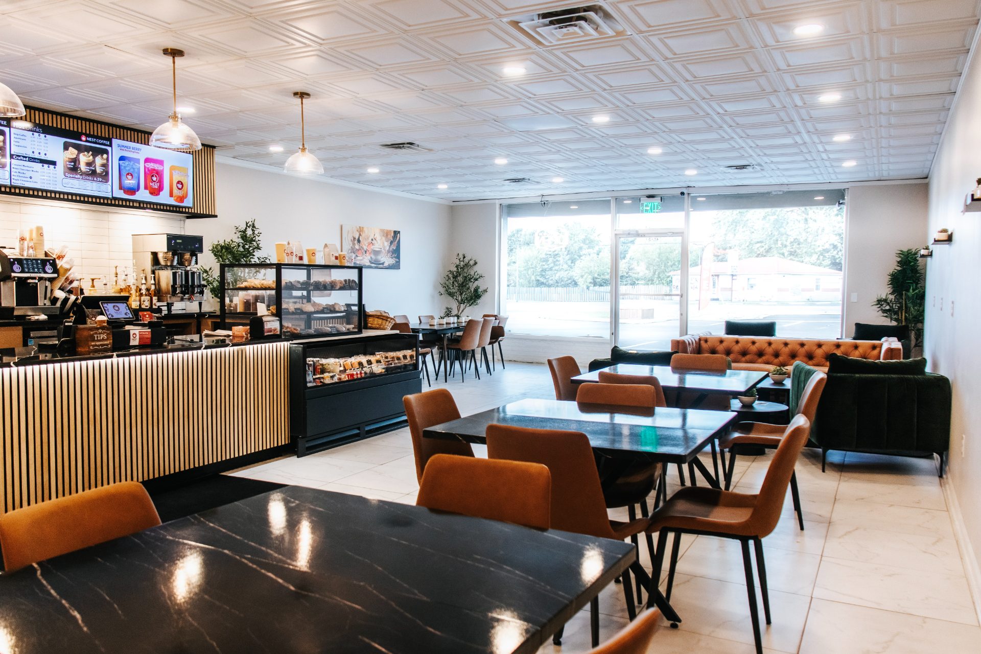 The Nest Coffee dining room, counter and menu boards